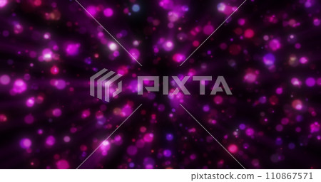 Abstract purple blurred holiday background with magical bokeh of glowing bright light energy small particles of flying dots on a black background Abstract purple blurred holiday background with magical bokeh of glowing bright light energy small particles of flying dots on a black background 110867571
