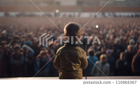 Small child gives a speech on stage in front of thousands people crowd, view from behind, neural network generated picture 110868367