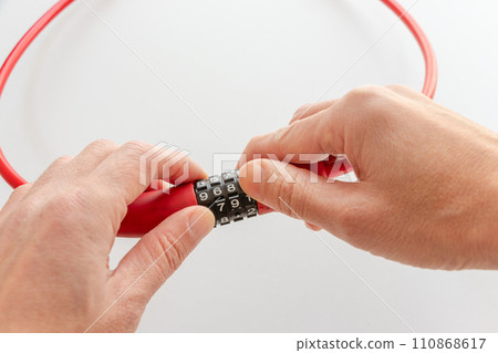 Match the numbers on the dial wire lock to unlock it. Match the numbers on the dial wire lock to unlock it. 110868617