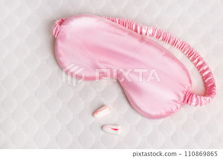 Silk sleep mask, earplugs, orthopedic pillow. All conditions for good deep sleep. close up 110869865