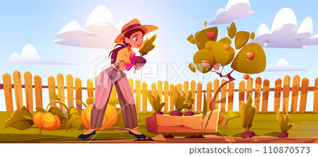 Young woman gardening on yard or field with fence 110870573