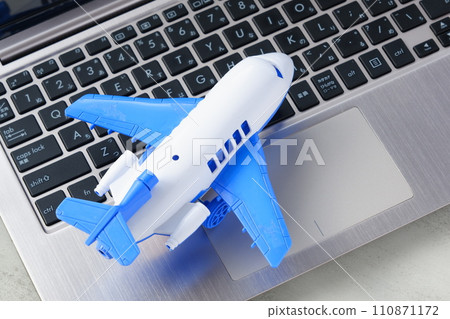 Image of travel with a toy airplane 110871172