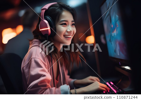 Asian girl playing games on PC 02 Asian girl playing games on PC 02 110871244
