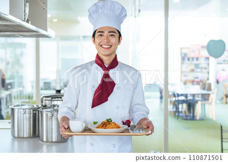 Cook carrying lunch plates Cook carrying lunch plates 110871501