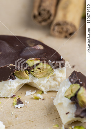 sweet chocolate with cocoa and nuts and other ingredients 110871610