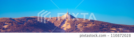 Jested Mountain with unique hotel and TV transmitter on the top on sunny winter day, Liberec, Czechia 110872028