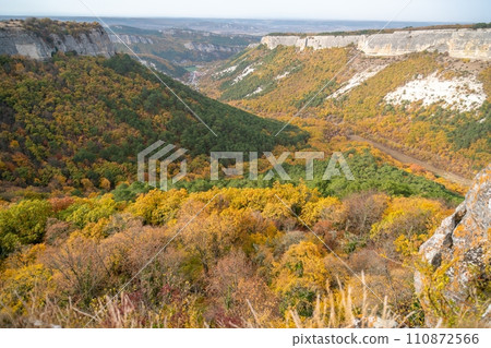 The autumn landscape of the mountain valley is an amazing, beautiful place at any time of the year. Hiking. Nature The autumn landscape of the mountain valley is an amazing, beautiful place at any time of the year. Hiking. Nature 110872566