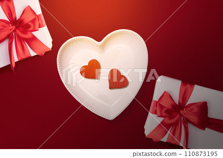 Heart plate with a red heart and a gift box Heart plate with a red heart and a gift box 110873195