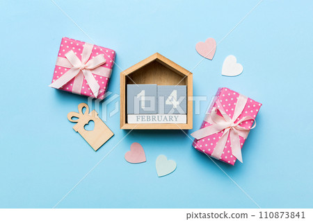 Valentine Day theme with wooden block calendar. Greeting card template for Valentines Day copy space for text 110873841