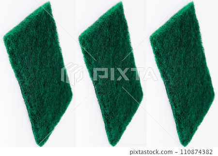 Green hand scrubber with fine fibers isolated on white background Green hand scrubber with fine fibers isolated on white background 110874382
