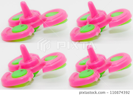 Toy spinner isolated on white background Toy spinner isolated on white background 110874392