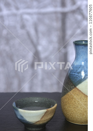 Yukimi sake with sake bottle and choko 110877605