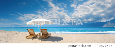 Sunbeds and umbrella on the beach, summer vacation background 110877677