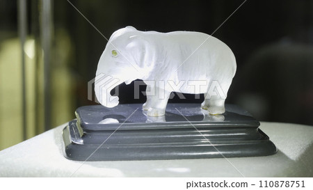 White figurine of an elephant. Statue of the white elephant White figurine of an elephant. Statue of the white elephant 110878751