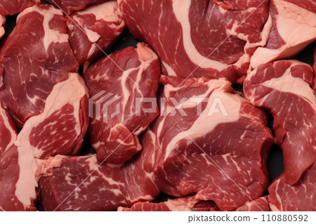 Marbled meat, top blade meat steak, on table background, with copy space for text Marbled meat, top blade meat steak, on table background, with copy space for text 110880592