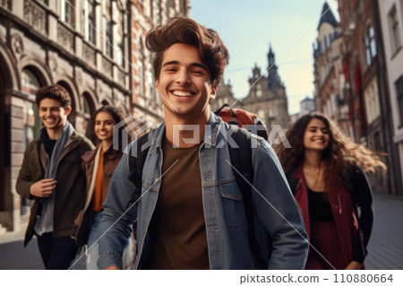 Happy multiracial friends walking down the street. Friendship concept with multicultural young people on winter clothes having fun together 110880664