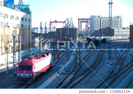 Railway yards and siding lines near Dalian Port, China (overhead view from the connecting walkway) Railway yards and siding lines near Dalian Port, China (overhead view from the connecting walkway) 110882234