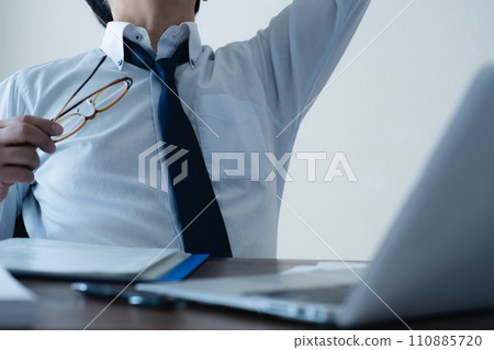 Businessman tired from work 110885720