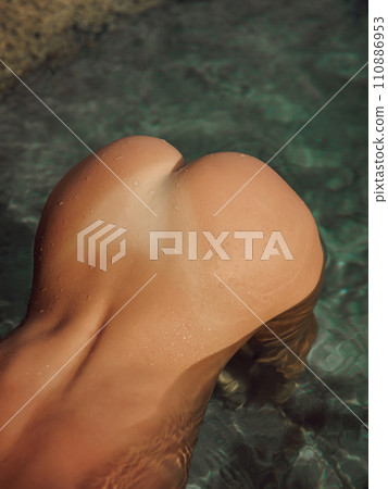 Sexy body of woman posing in sea. Attractive model with slim body 110886953