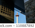 In spring in front of Kyoto Station, you can see Kyoto Tower rising against the blue sky in a picture frame on the wall of the station building. 110887892
