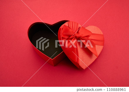 Heart shaped Gift box for Valentine's Day on red background 110888961