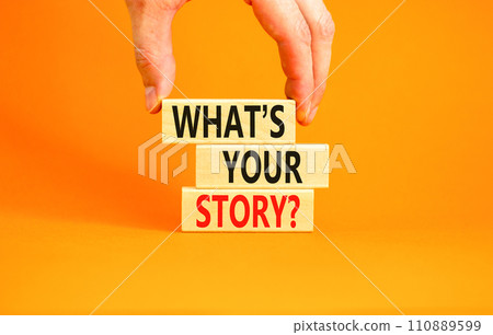 Storytelling and what is your story symbol. Concept words What is your story on blocks. Beautiful orange background. Businessman hand. Business storytelling and what is your story concept. Copy space. Storytelling and what is your story symbol. Concept words What is your story on blocks. Beautiful orange background. Businessman hand. Business storytelling and what is your story concept. Copy space. 110889599