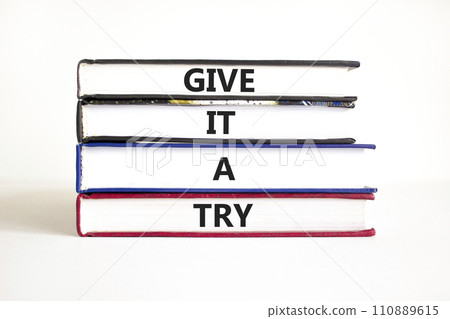 Give it a try symbol. Concept word Give it a try on beautiful book. Beautiful white table white background. Business give it a try concept. Copy space. Give it a try symbol. Concept word Give it a try on beautiful book. Beautiful white table white background. Business give it a try concept. Copy space. 110889615