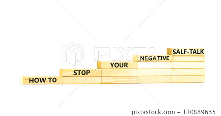 Stop negative self-talk symbol. Concept words How to stop your negative self-talk on wooden block. Beautiful white table white background. Psychological negative self-talk concept. Copy space Stop negative self-talk symbol. Concept words How to stop your negative self-talk on wooden block. Beautiful white table white background. Psychological negative self-talk concept. Copy space 110889635