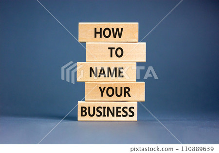 How to name your business symbol. Concept words How to name your business on wooden blocks. Beautiful grey table grey background. How to name your business concept. Copy space. How to name your business symbol. Concept words How to name your business on wooden blocks. Beautiful grey table grey background. How to name your business concept. Copy space. 110889639