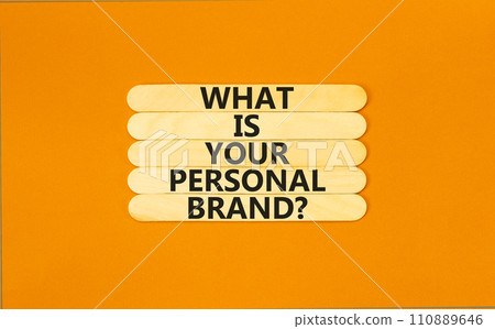 What is your personal brand symbol. Concept words What is your personal brand on wooden stick. Beautiful orange table orange background. Business, what is your personal brand concept. Copy space. What is your personal brand symbol. Concept words What is your personal brand on wooden stick. Beautiful orange table orange background. Business, what is your personal brand concept. Copy space. 110889646