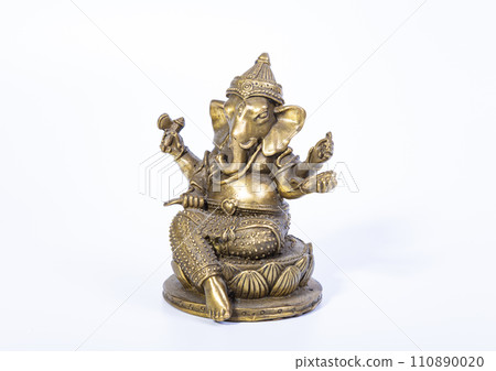 Hindu God Ganesh (Ganesha) Statuette, isolated on a white background 110890020