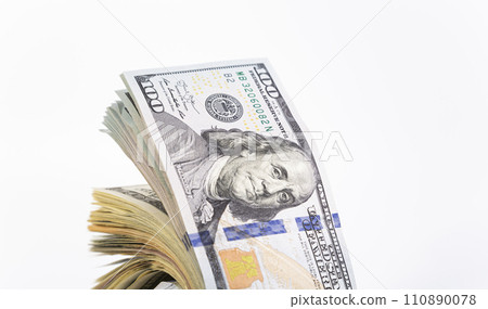 One hundred dollar bills, on a white background One hundred dollar bills, on a white background 110890078