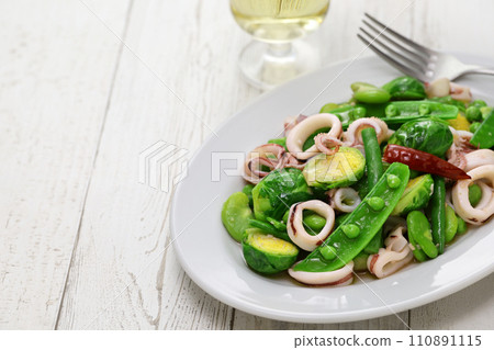 Spring salad of Brussels sprouts, squid, and beans. Spring salad of Brussels sprouts, squid, and beans. 110891115