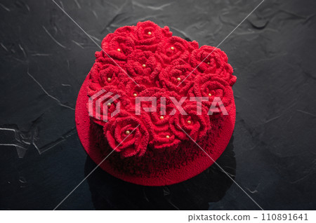 red velvet cake black background 110891641