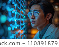 young asian man working with futuristic transparent interface 110891879