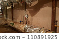 A heating unit from the inside in the basement of an apartment building 110891925