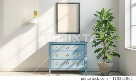 Blank black poster frame mock up template, room interior in fusion style, white walls on background, light blue dresser and green plant. Play of light and shadows 110891963
