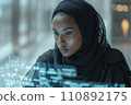 young black woman working with futuristic transparent interface 110892175