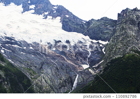 The Caucasus Mountains. Mountain peaks in summer. 110892786