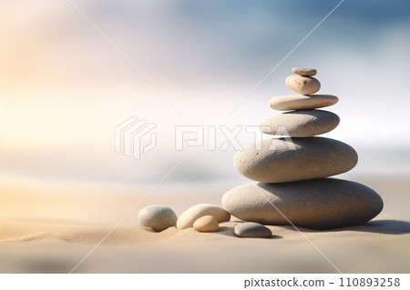 Zen stones stack on sand waves in a minimalist setting for balance and harmony Zen stones stack on sand waves in a minimalist setting for balance and harmony 110893258
