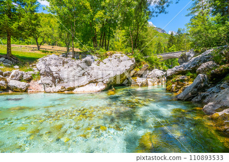 Stone Bridge and clear water of Soca River at Small Soca Gorge, Julian Alps, Slovenia 110893533