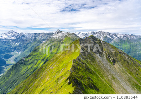 Majestic alpine panorama with glacier mountain of Grossvenediger. The main peak of the Venediger Group in Hohe Tauern mountain range. Austrian Alps, Austria. 110893544