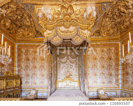 Bedchamber of the King. Decorated interior with historical furniture and architectural details of Chateau Versailles near Paris, France 110893587