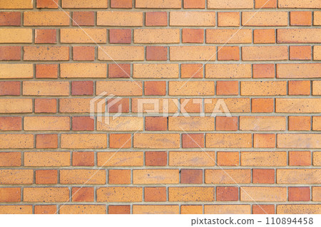 Old yellow brick wall texture background with natural weathered appearance Old yellow brick wall texture background with natural weathered appearance 110894458