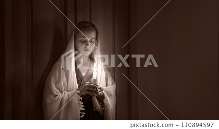 Young pretty gitj whith candle 110894597