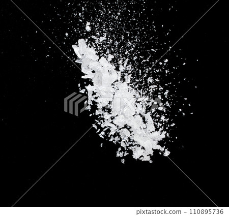 Ice Cubes explosion flying, crystal clear ice wave floating, fall down in air. Ice Brick crack cube is frozen water healthy thirsty. Black background Isolated high speed shutter, freeze stop motion 110895736