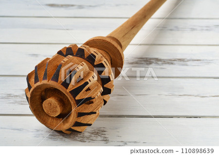 Mexican molinillo cooking utensils for making chocolate 110898639