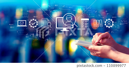 Document management system concept with person using a smartphone at night Document management system concept with person using a smartphone at night 110899977