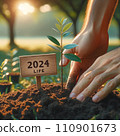 Tree Planting in Park with 2024 LIFE Sign 110901673