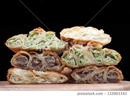 Burek pie with meat, cheese or spinach Burek pie with meat, cheese or spinach 110903383